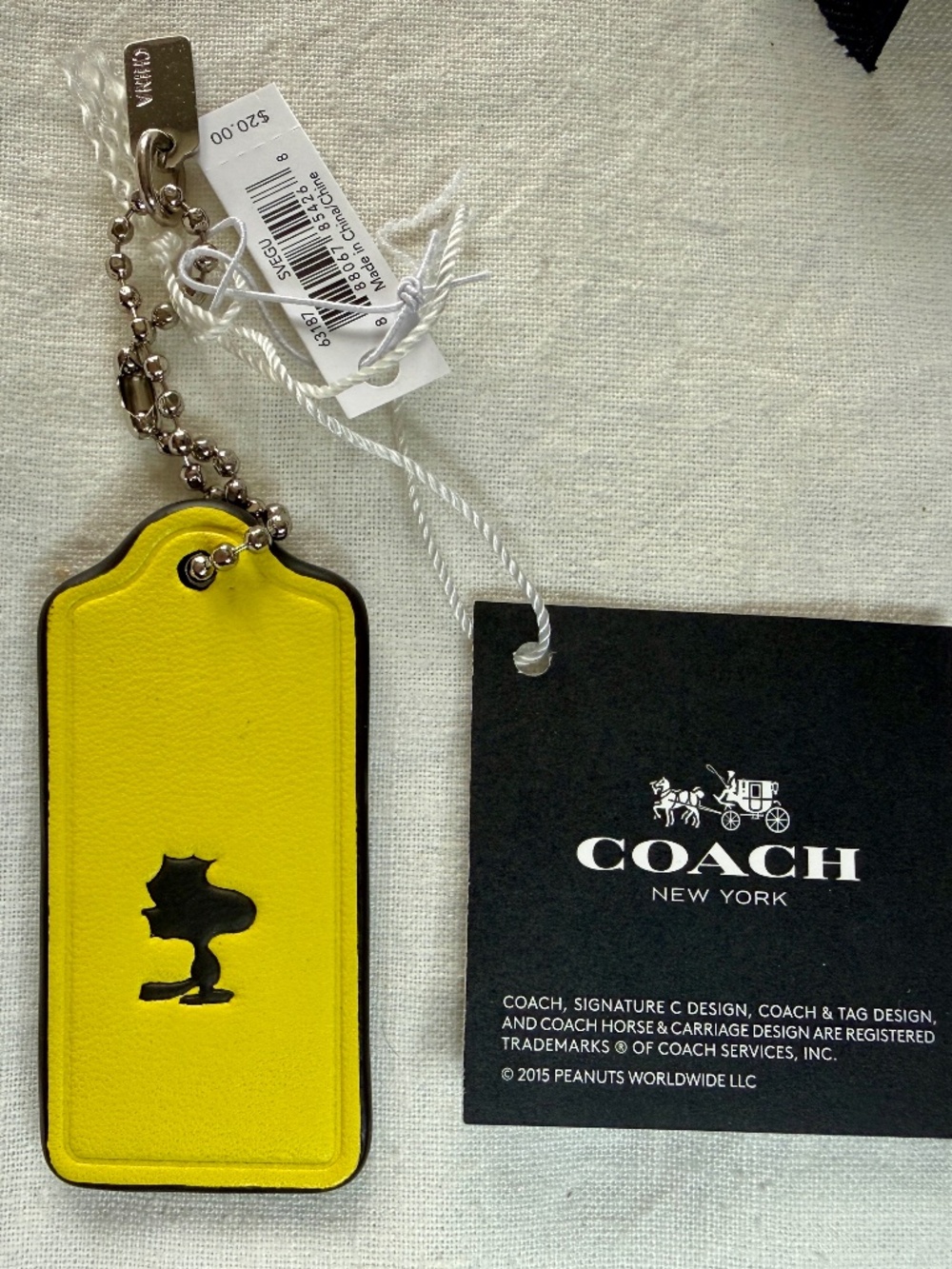 NWT COACH X Peanuts WOODSTOCK Leather Hangtag Key Fob Ring Bag Charm Yellow RARE
